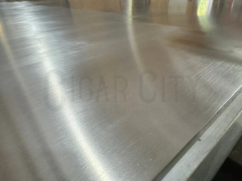 Heavy-duty bare skid frame for pressure washing rigs and contractor systems